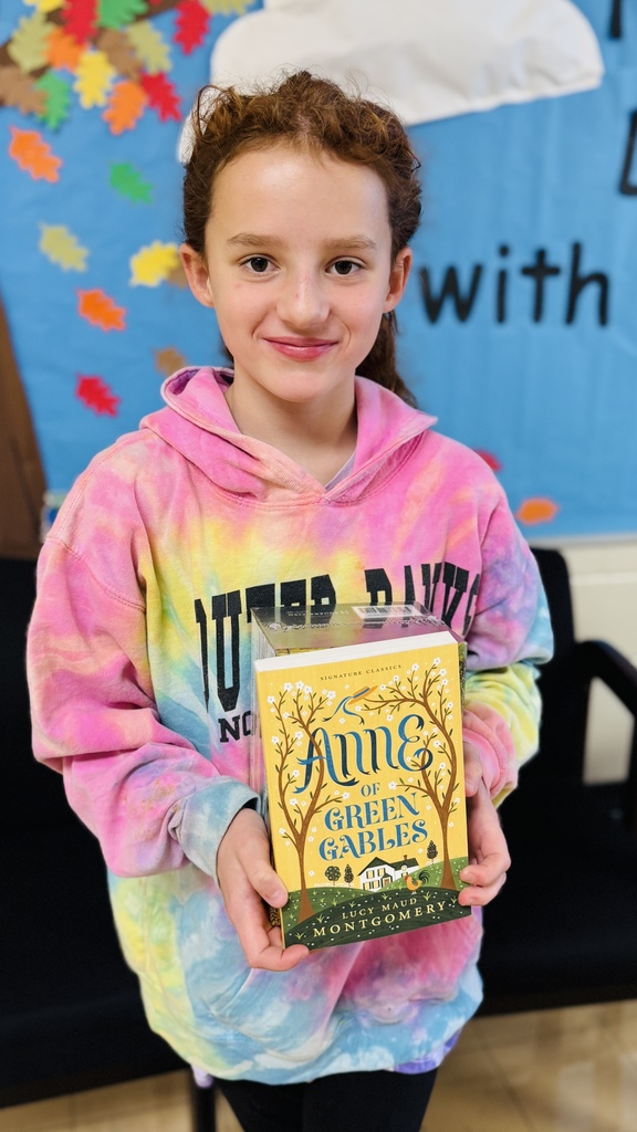 Victoria holding her books