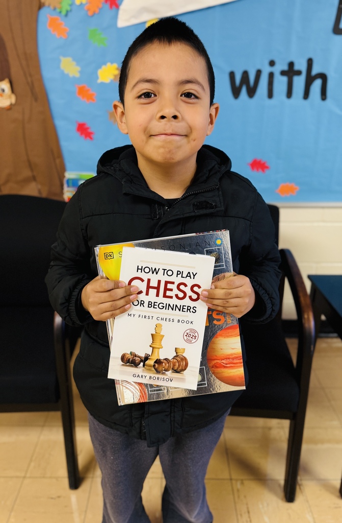 Gael holding his books