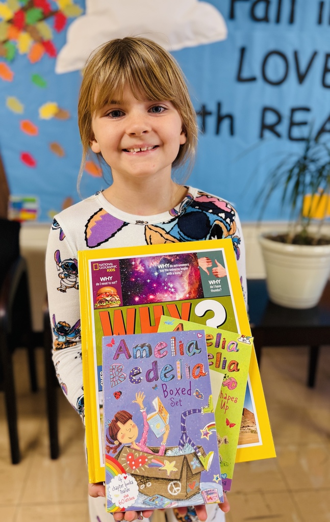 Addison holding her books