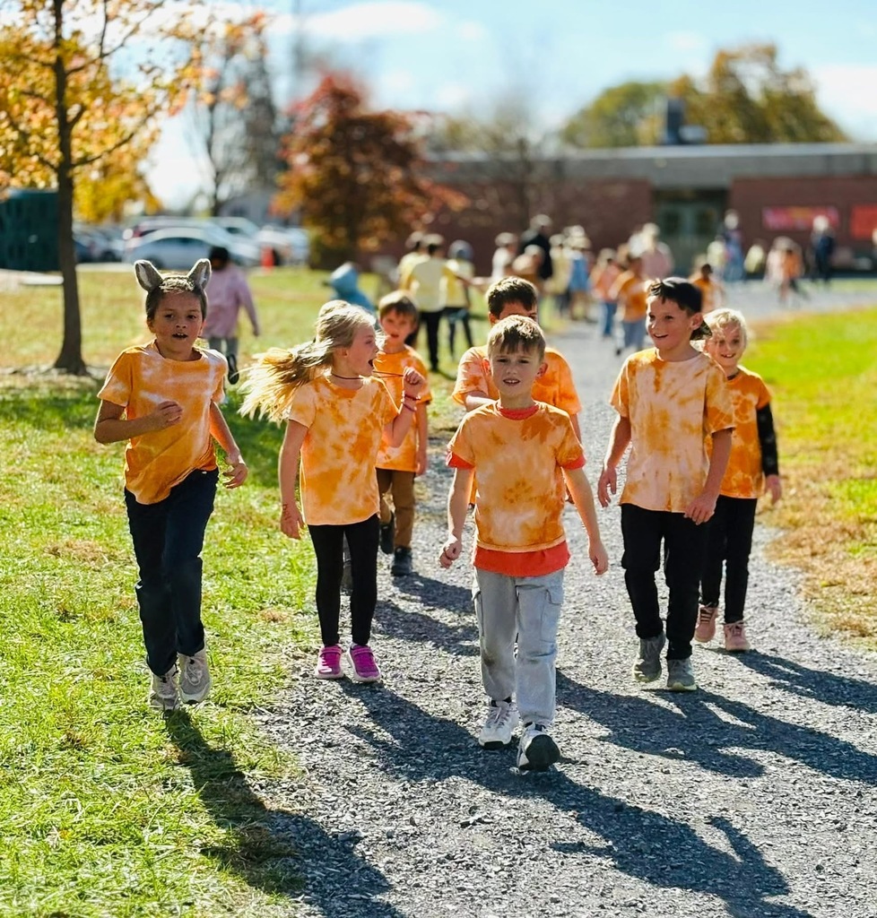 students running on track