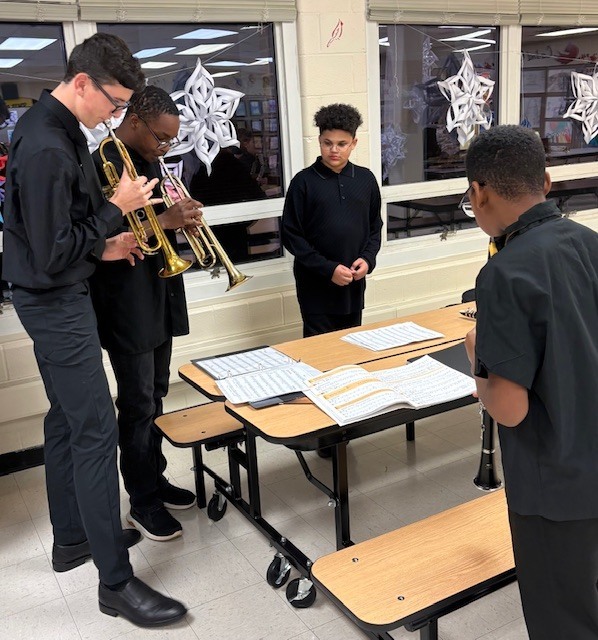 Students practice before the concert