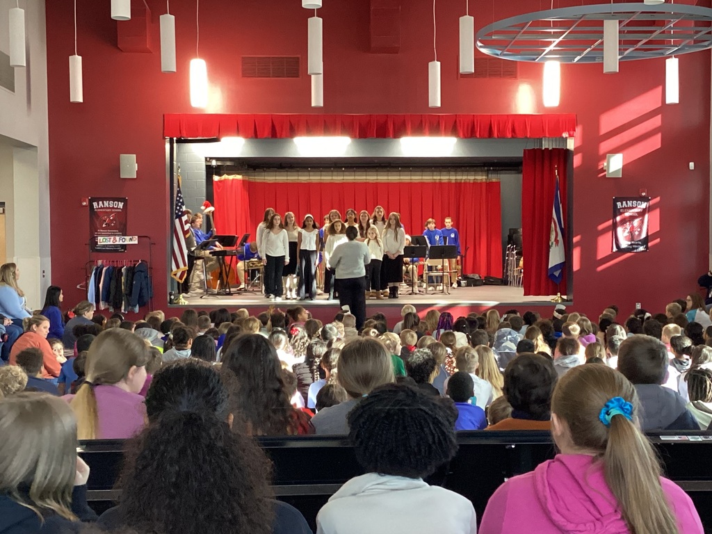 RES students watching and listening to HFMS choir