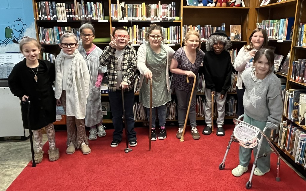 Students dressed as old ladies and men for the 100th day of school