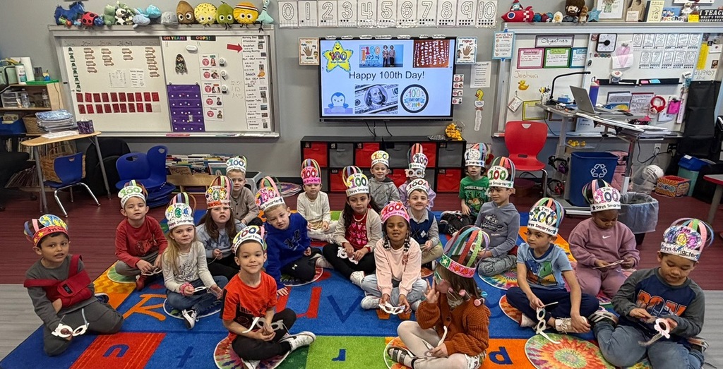 Kindergarten students wearing 100 day smarter hats