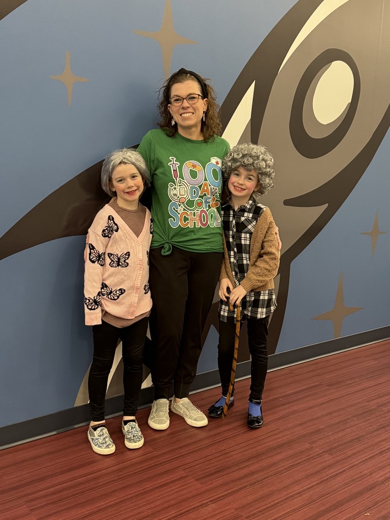 School nurse with her two daughters dressed in gray wigs