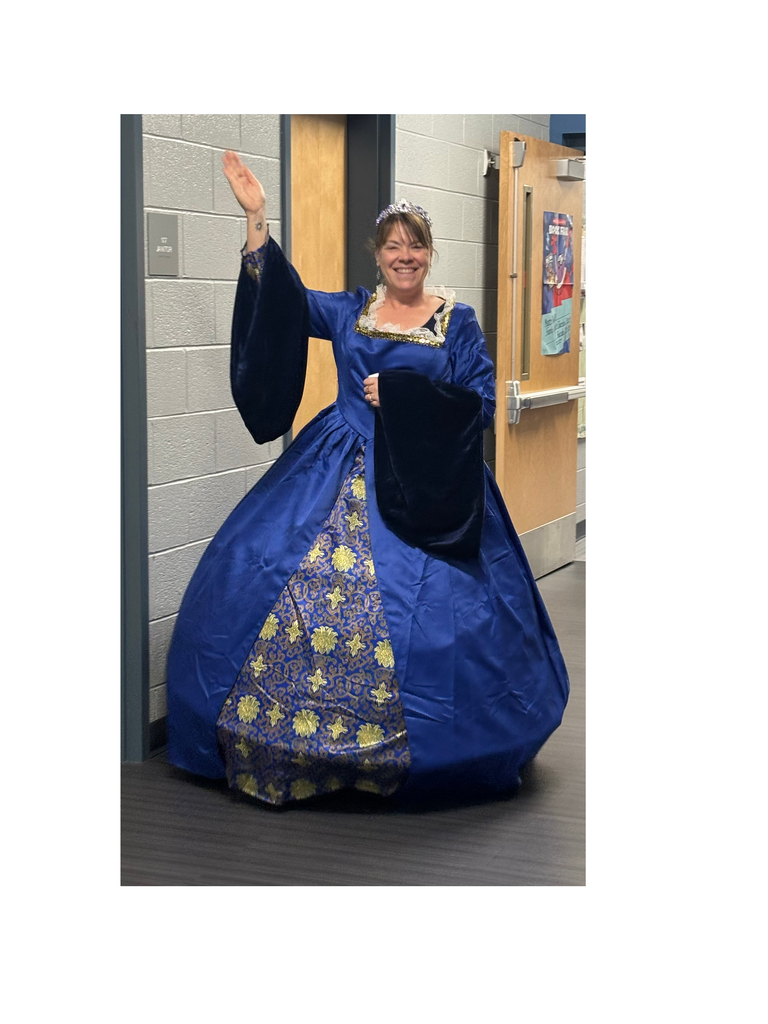 Mrs. Smith in queen gown waving