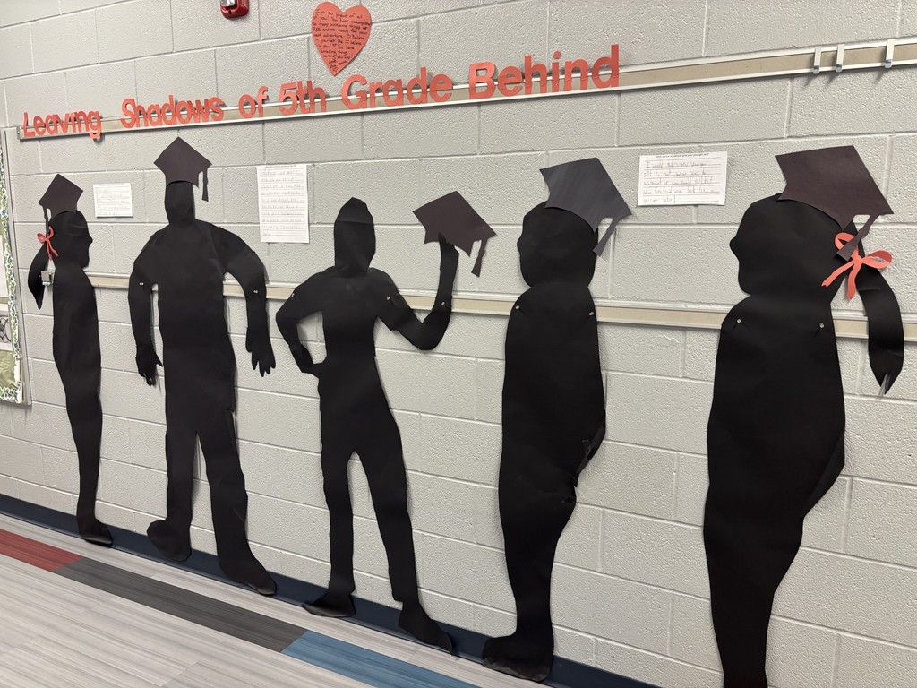 shadow cut outs of fifth grade students