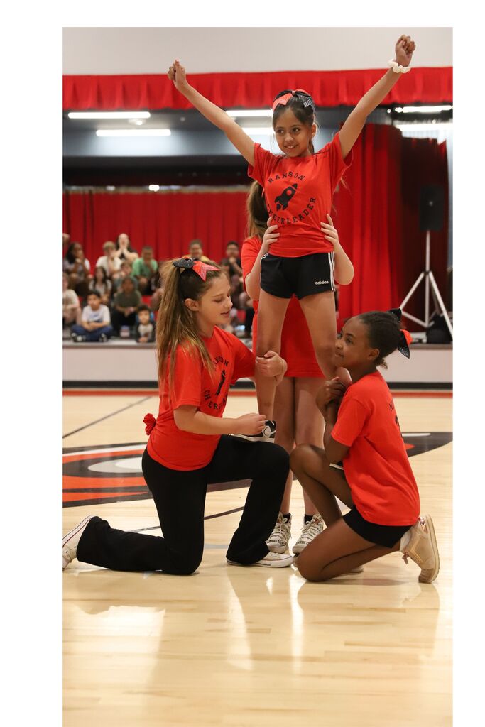 Third grade students posing
