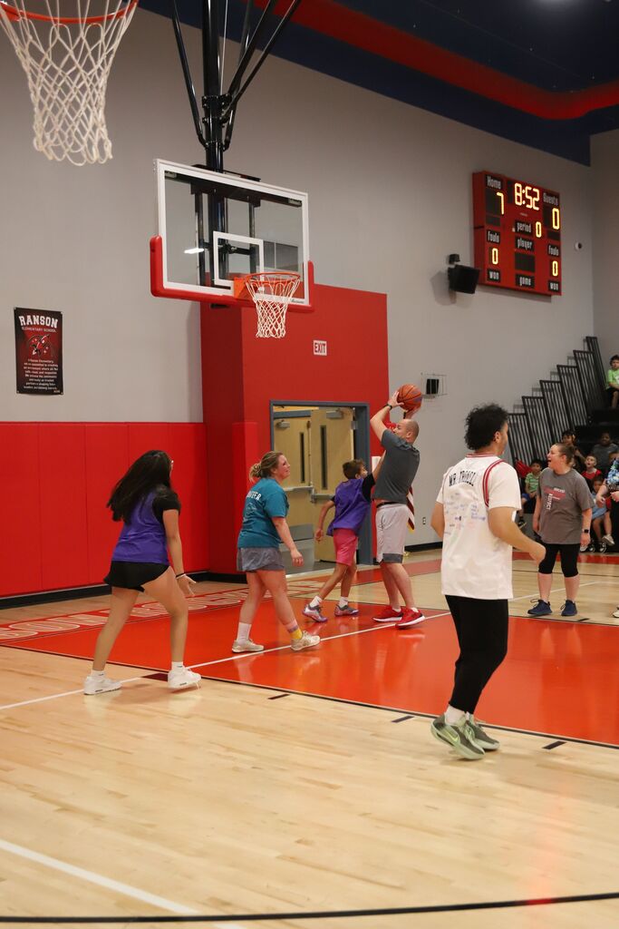 Mr. A shooting a basket
