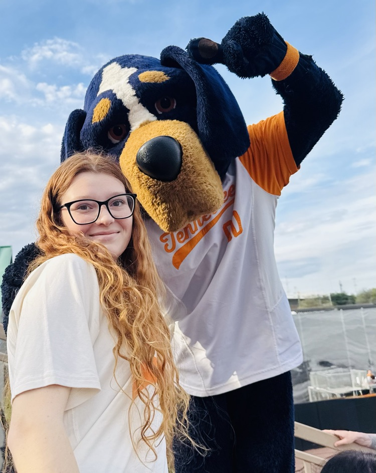 Sophia cates with man in dog costume