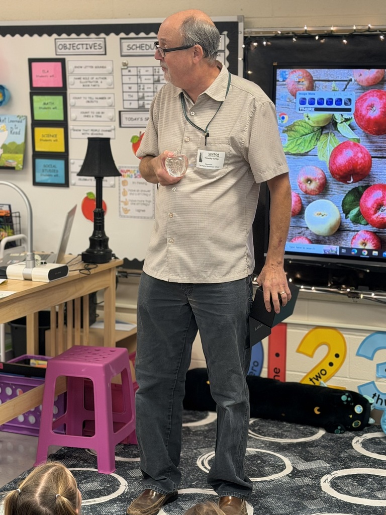 Mr. Artlip with a small gift from Mrs. Williams