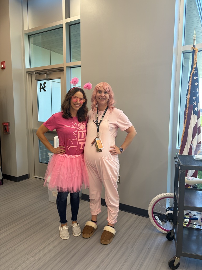 Mrs. Walls and Ms. Ashley dressed in pink outfits