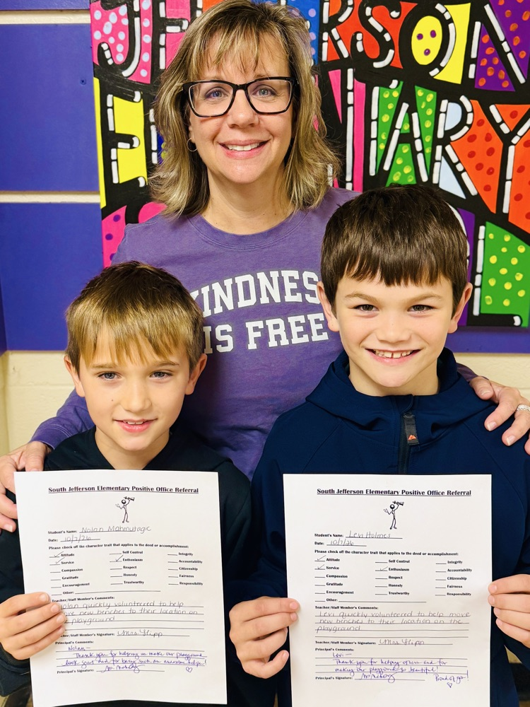 Nolan and Levi receive an award