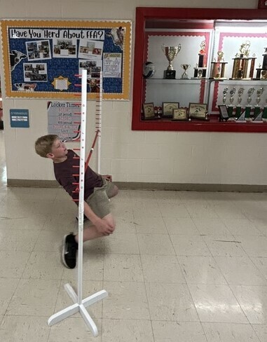 Student doing limbo
