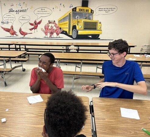 Students participating in a marshmallow eating contest