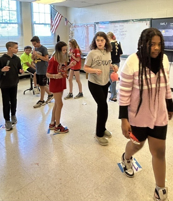 Students participating in a cake/ treat walk