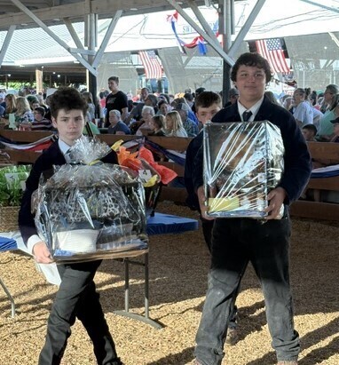 Students showing FFA bake items