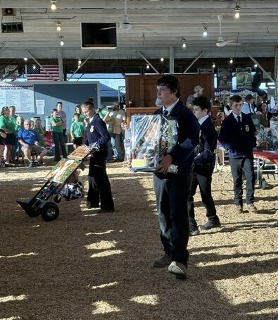 Students walking around with the FFA bake items