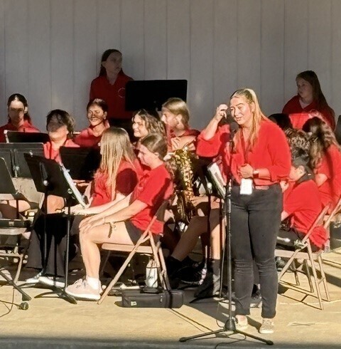 Band Director thanking the audience