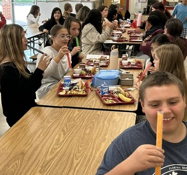 Students eating popsicles