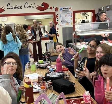 Students eating popsicles