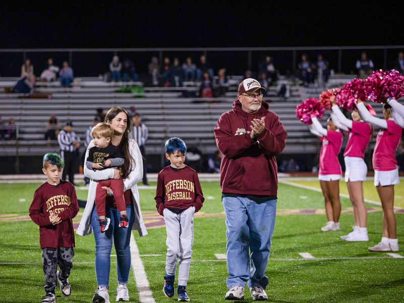 Jeff Reynolds walking into cougar Stadium with his family