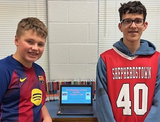 Two students with their Social Studies Fair project