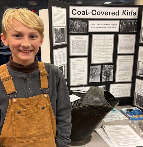 Student with Social Studies Fair Project on Coal