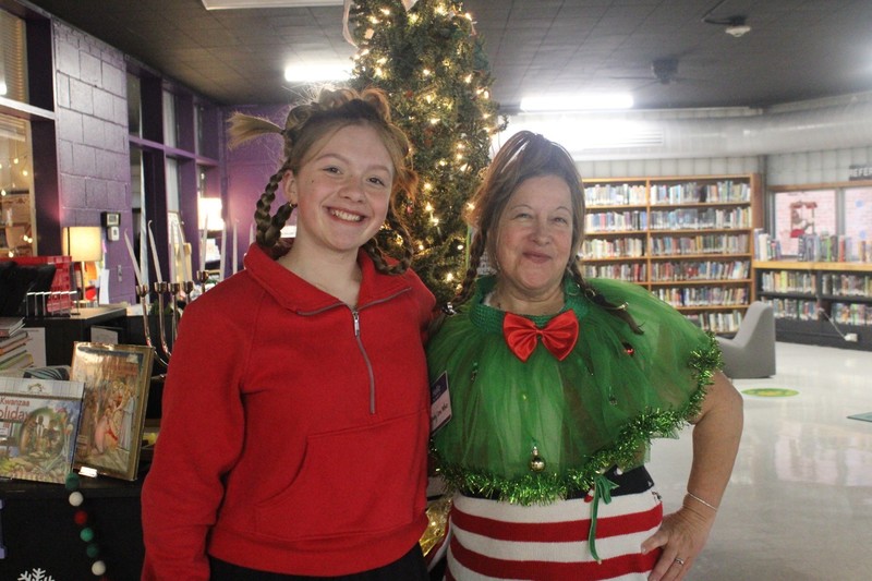 Students and staff dressed in holiday outfits