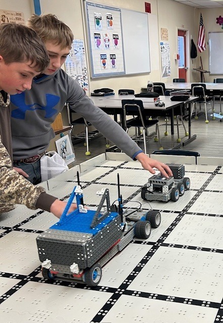 Students setting up robots to compete