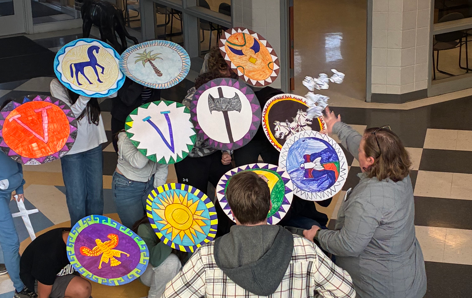 Students Using Shields in Formation