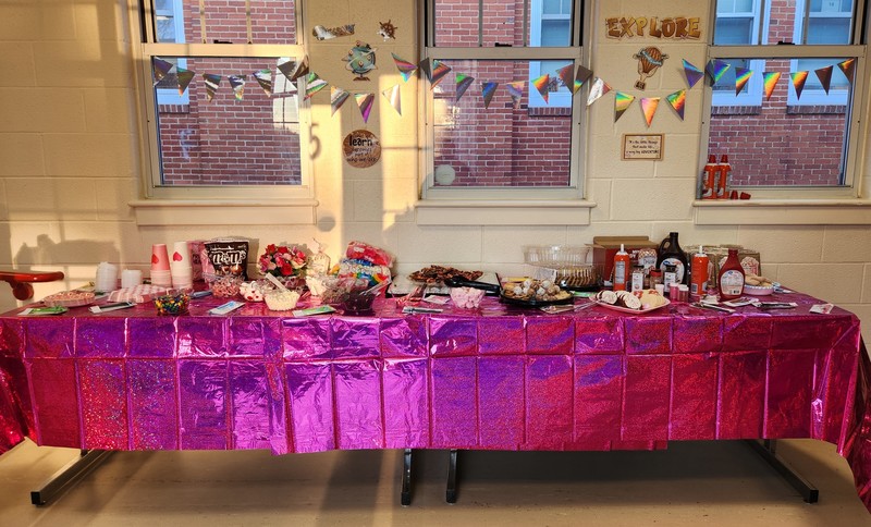 Display of candy, cocoa toppings and cookies