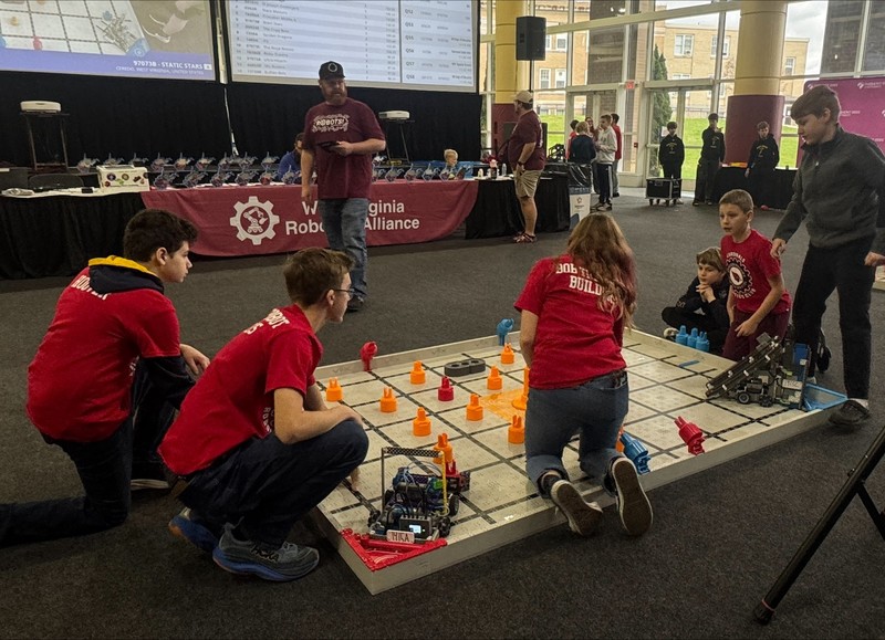 Students practicing driving their robot at the state robotics tournament