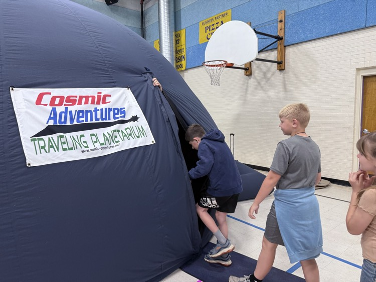 students in planetarium 