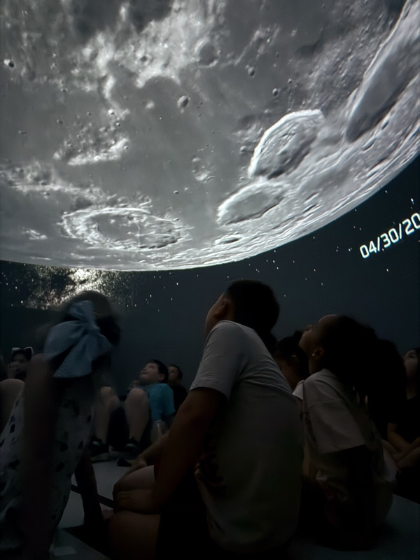 students in planetarium 