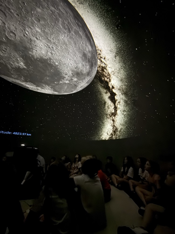 students in planetarium 
