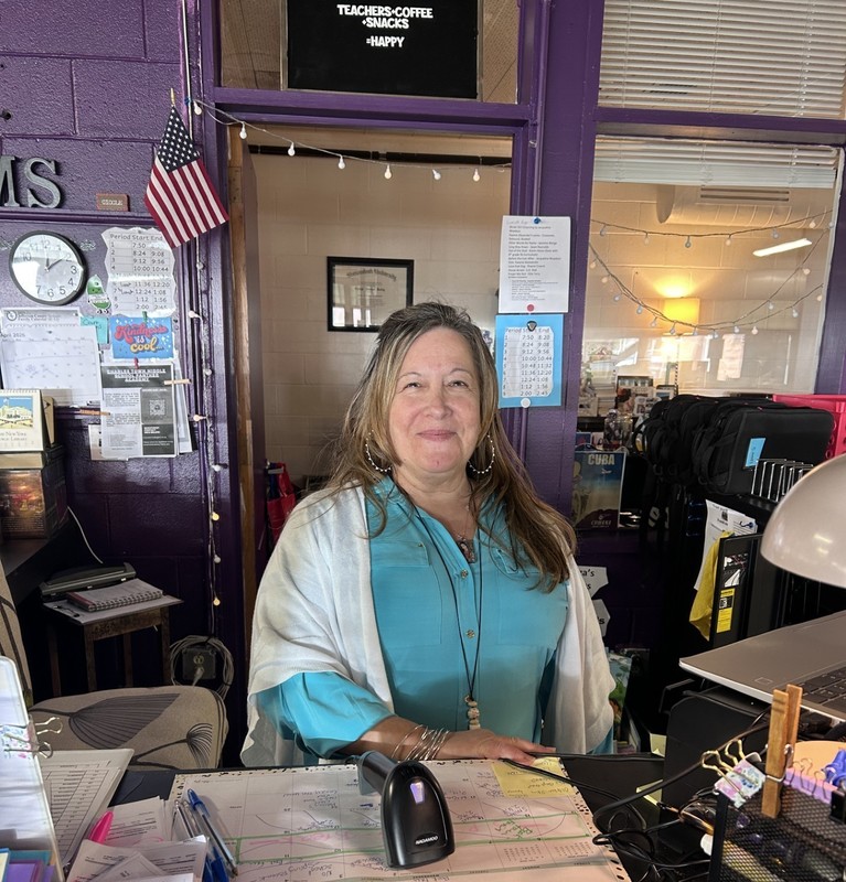 Mrs. Reilly posing in Media Center