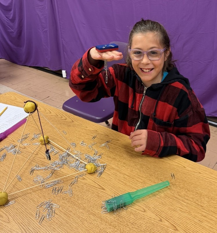 students discovering with magnets