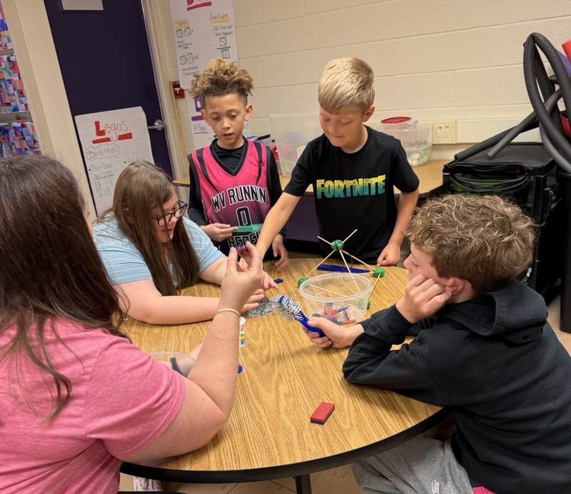 students discovering with magnets