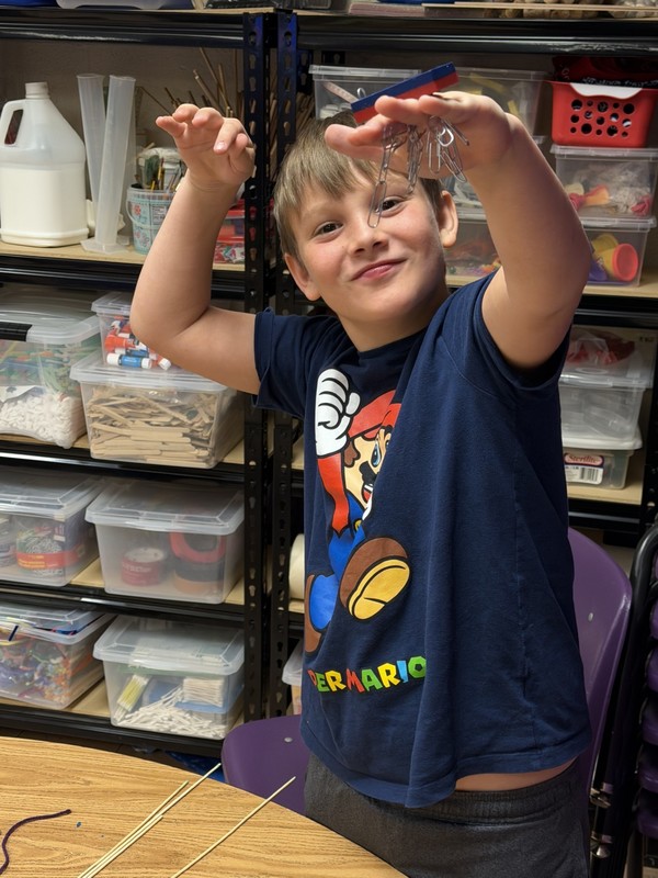 students discovering with magnets
