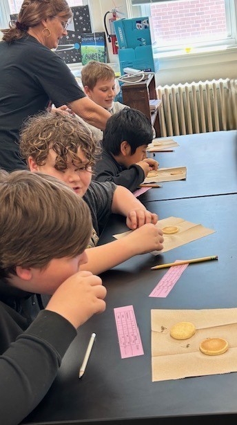 Students tasting maple syrup