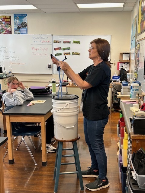 Teacher showing the tapping equipment