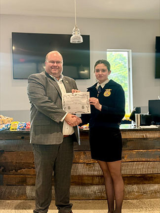 Piper Stolipher  receiving certificate