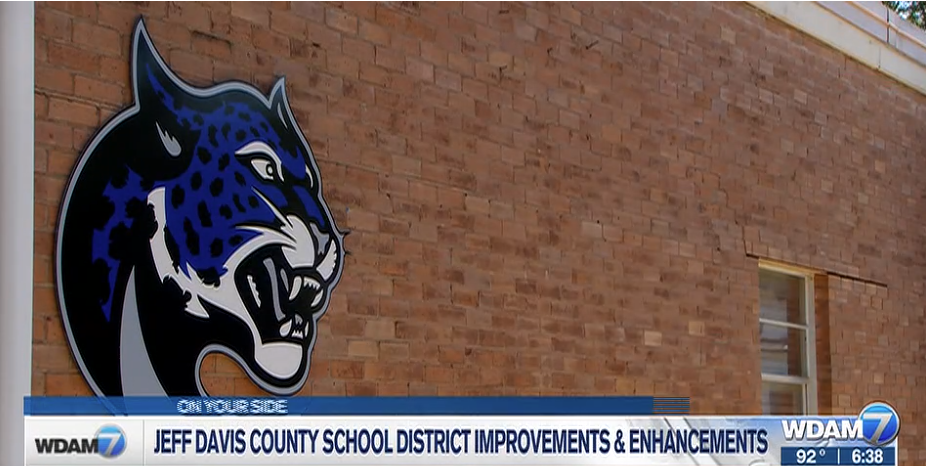 Jaguar emblem on the side of brick building Jeff Davis school district improvements and enhancements