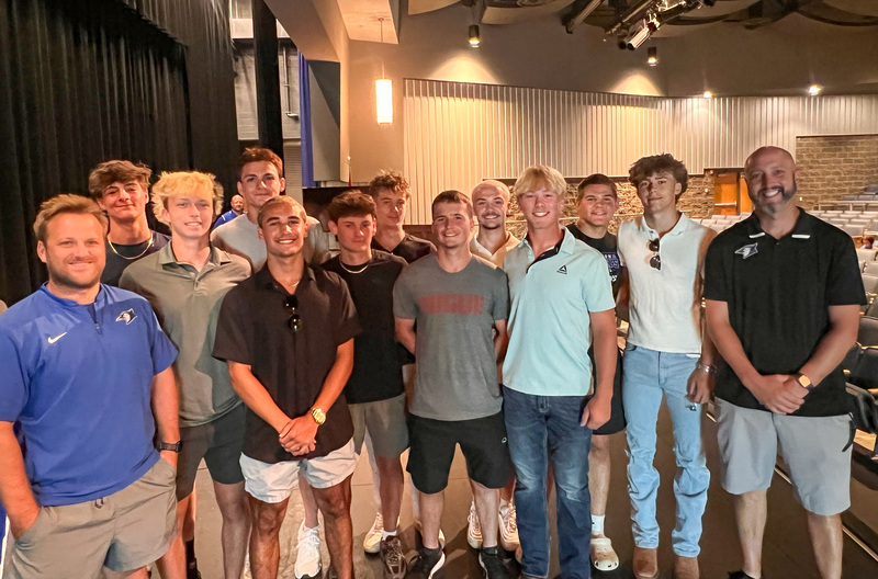 Baseball coaches and athletes being recognized at the July 15th board meeting