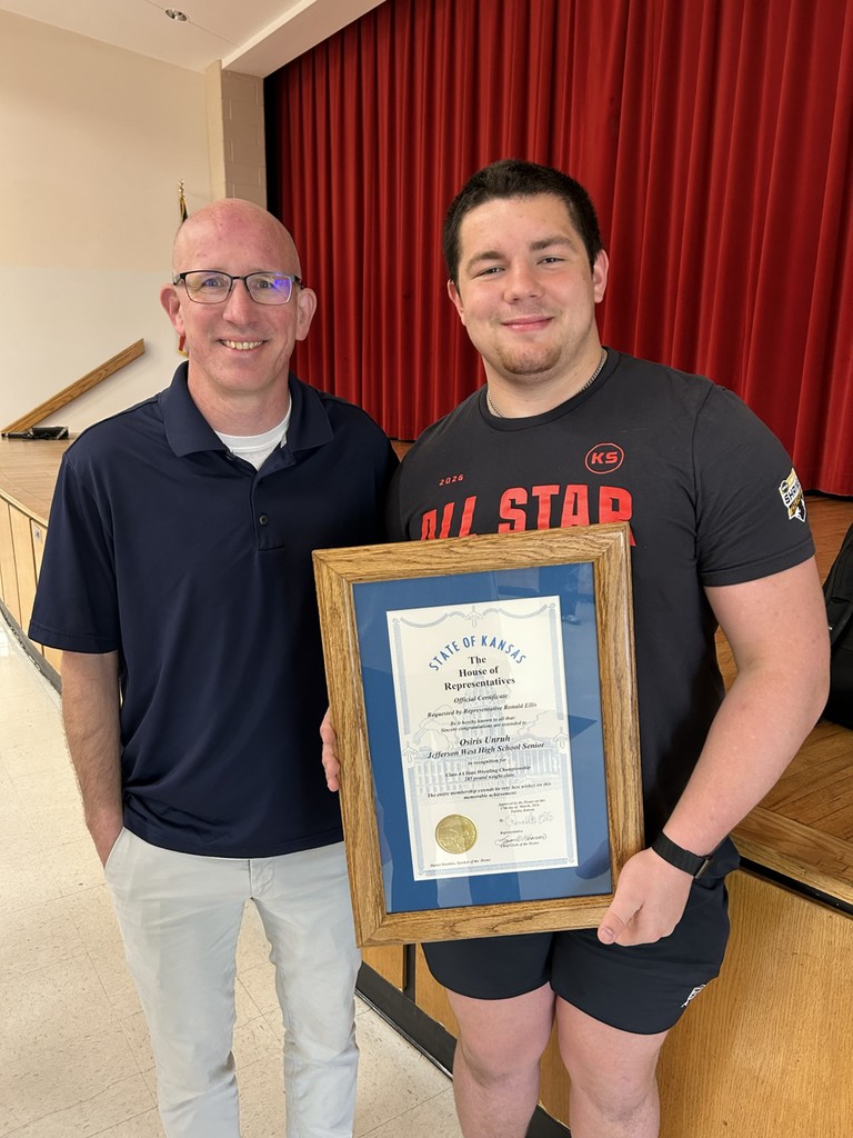 Osiris Unruh and Coach Shawn Dolezilek