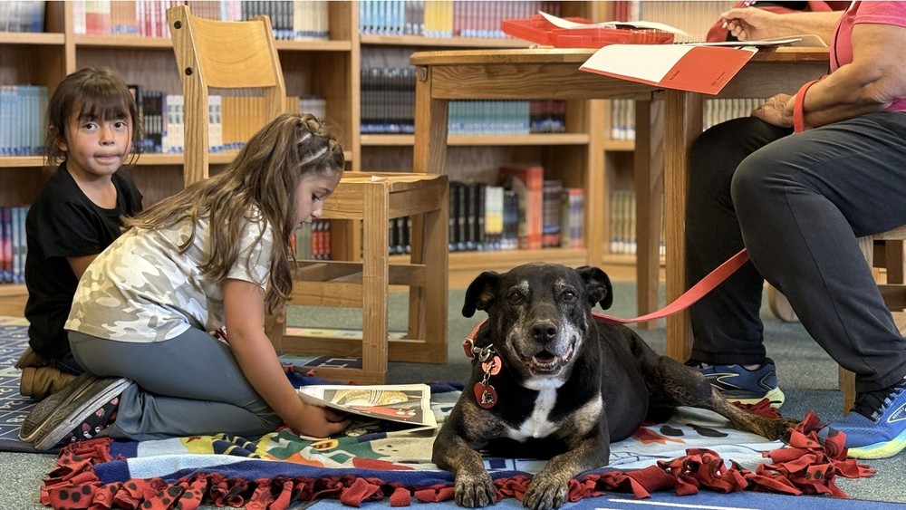 Students Reading with Buddy