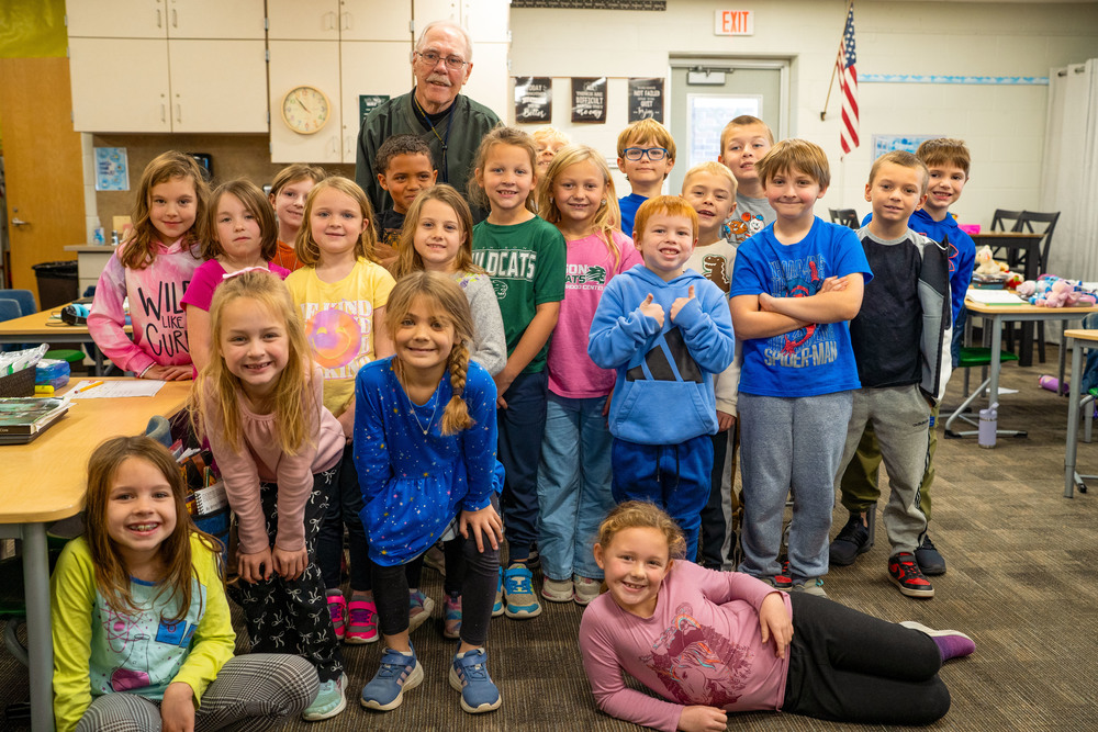 Student with thank you note
