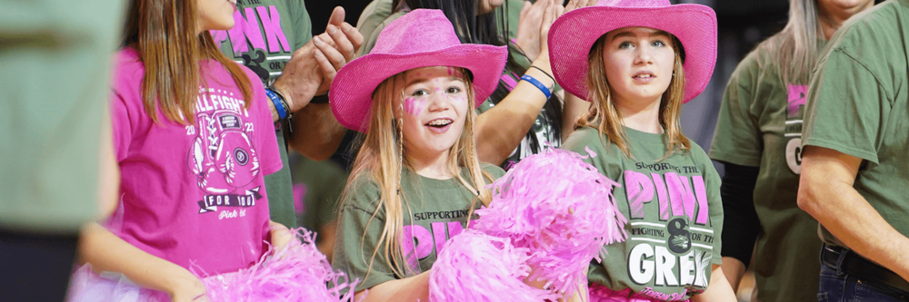 Female students at Pinkout Basketball Game