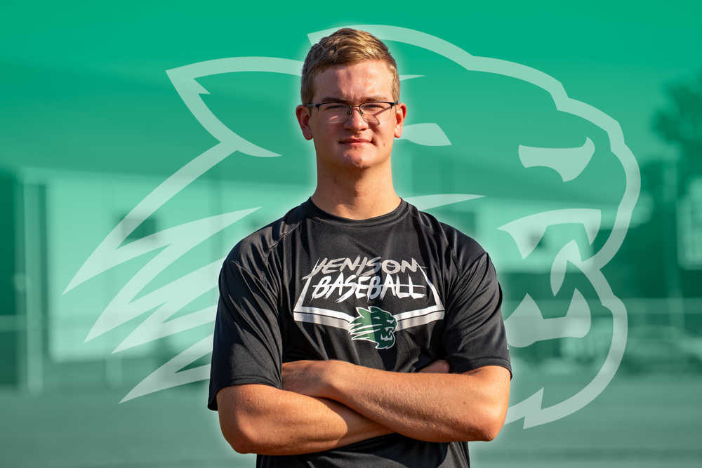 Jenison baseball player with cat head logo watermark